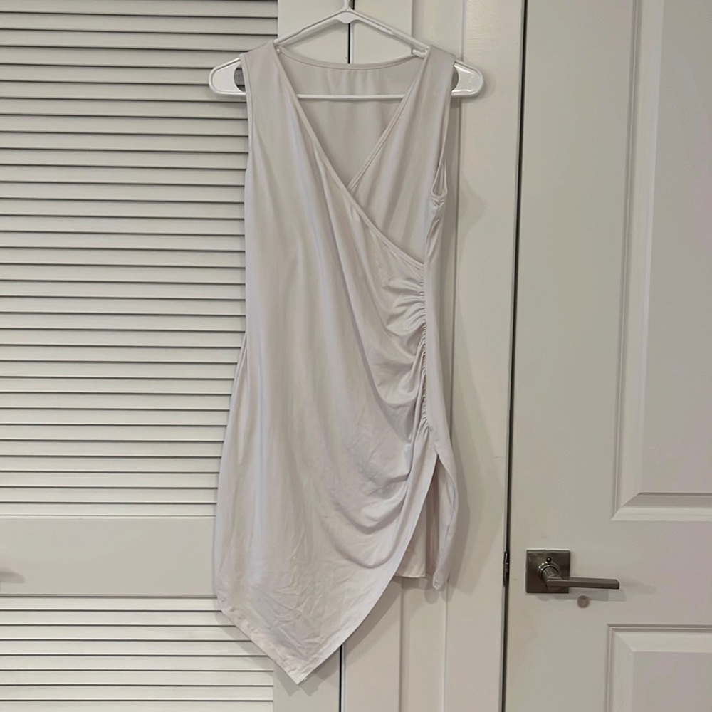 Asymmetrical white wrap dress